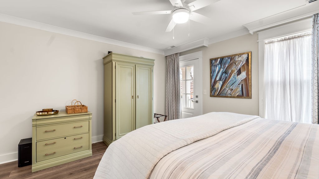 819 North Maple Street Murfreesboro, TN 37130 - Photo 29 of 64 a bedroom with a bed and a chandelier