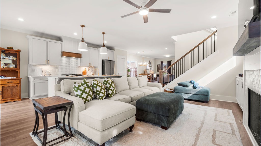 819 North Maple Street Murfreesboro, TN 37130 - Photo 3 of 64 a living room with furniture kitchen view and a chandelier
