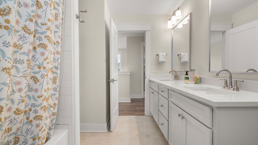 819 North Maple Street Murfreesboro, TN 37130 - Photo 42 of 64 a spacious bathroom with a double vanity sink mirror and double