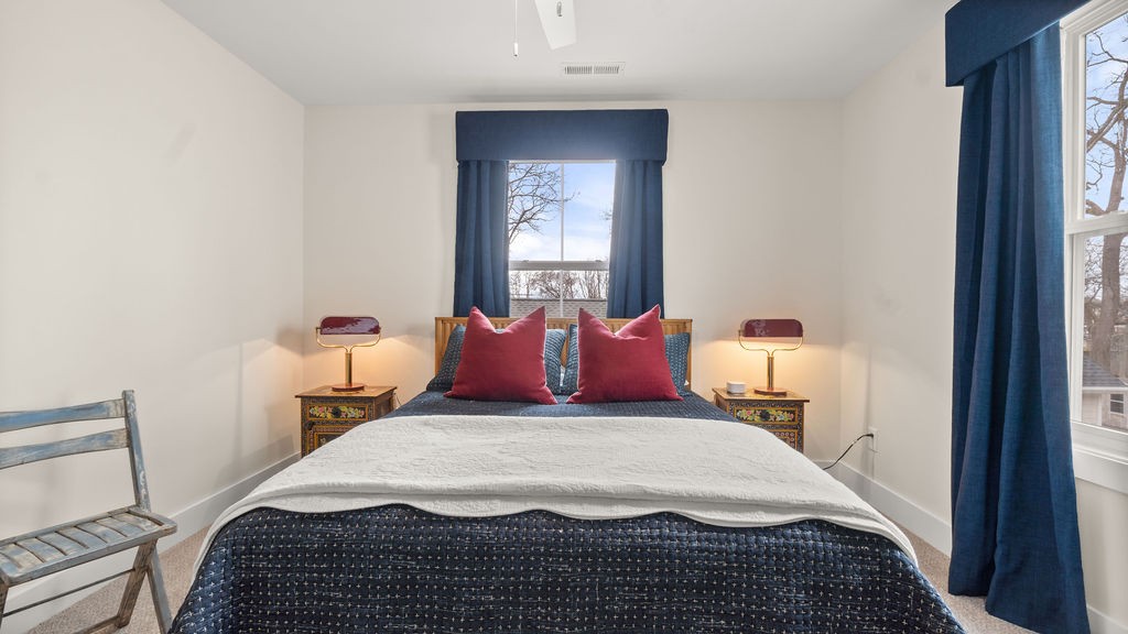 819 North Maple Street Murfreesboro, TN 37130 - Photo 44 of 64 a bed sitting in a bedroom next to a window