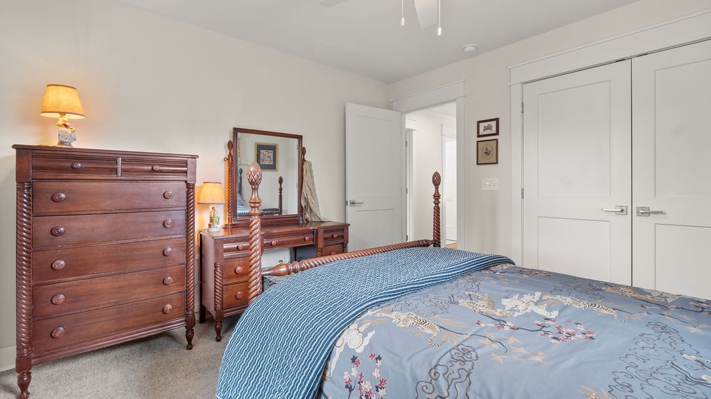 819 North Maple Street Murfreesboro, TN 37130 - Photo 51 of 64 a bedroom with a bed and a dresser