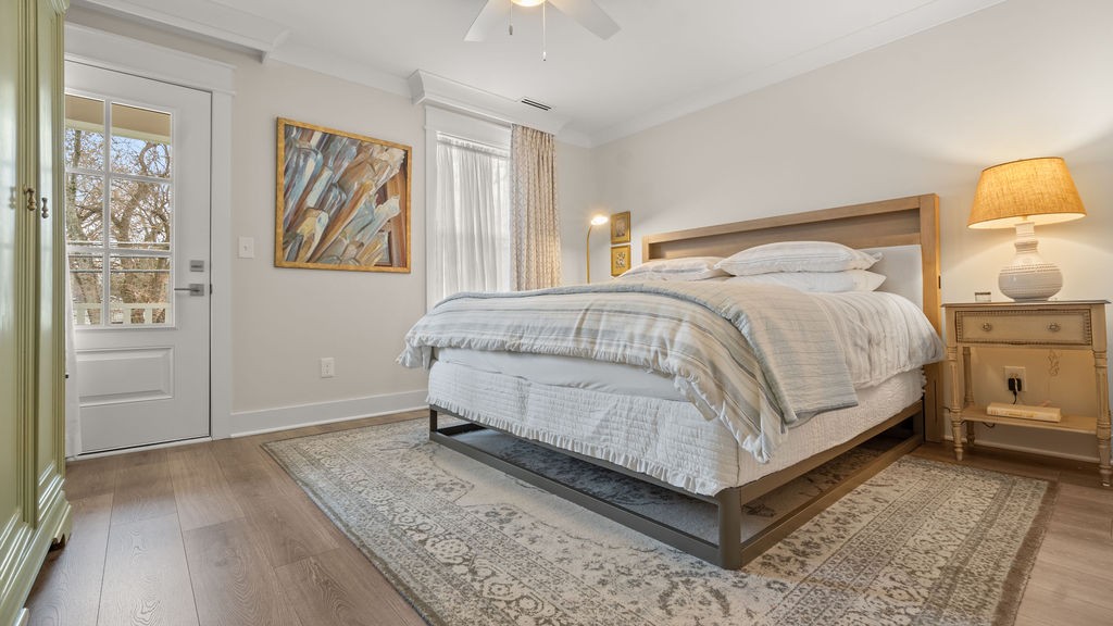 819 North Maple Street Murfreesboro, TN 37130 - Photo 58 of 64 a bed sitting in a bedroom next to a window