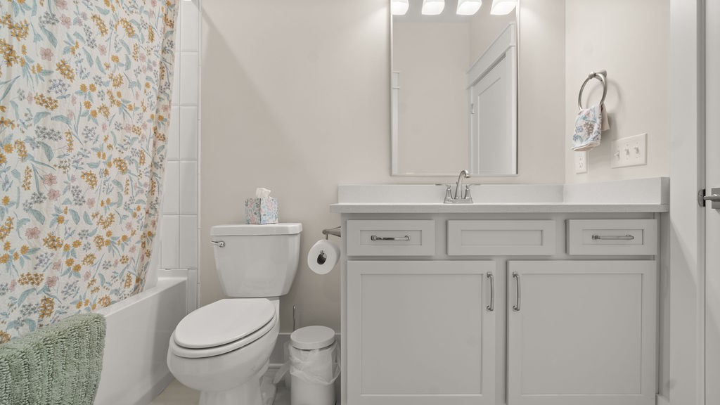 819 North Maple Street Murfreesboro, TN 37130 - Photo 62 of 64 a bathroom with a sink a toilet and a mirror