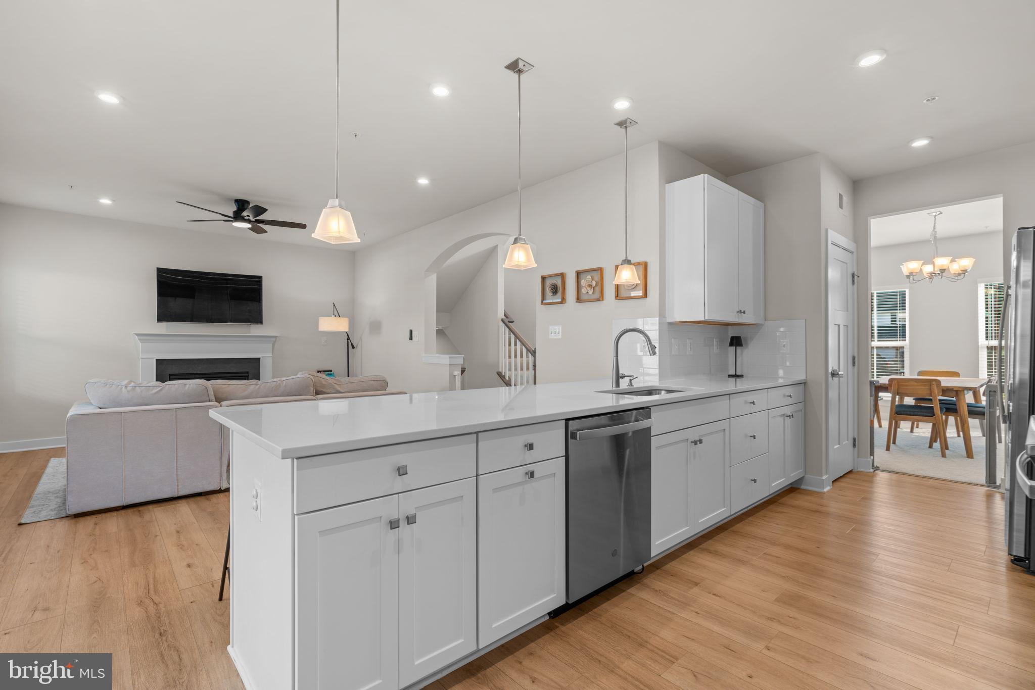203 Baughmans Lane Frederick, MD 21702 - Photo 11 of 56 Modern kitchen with open living space.