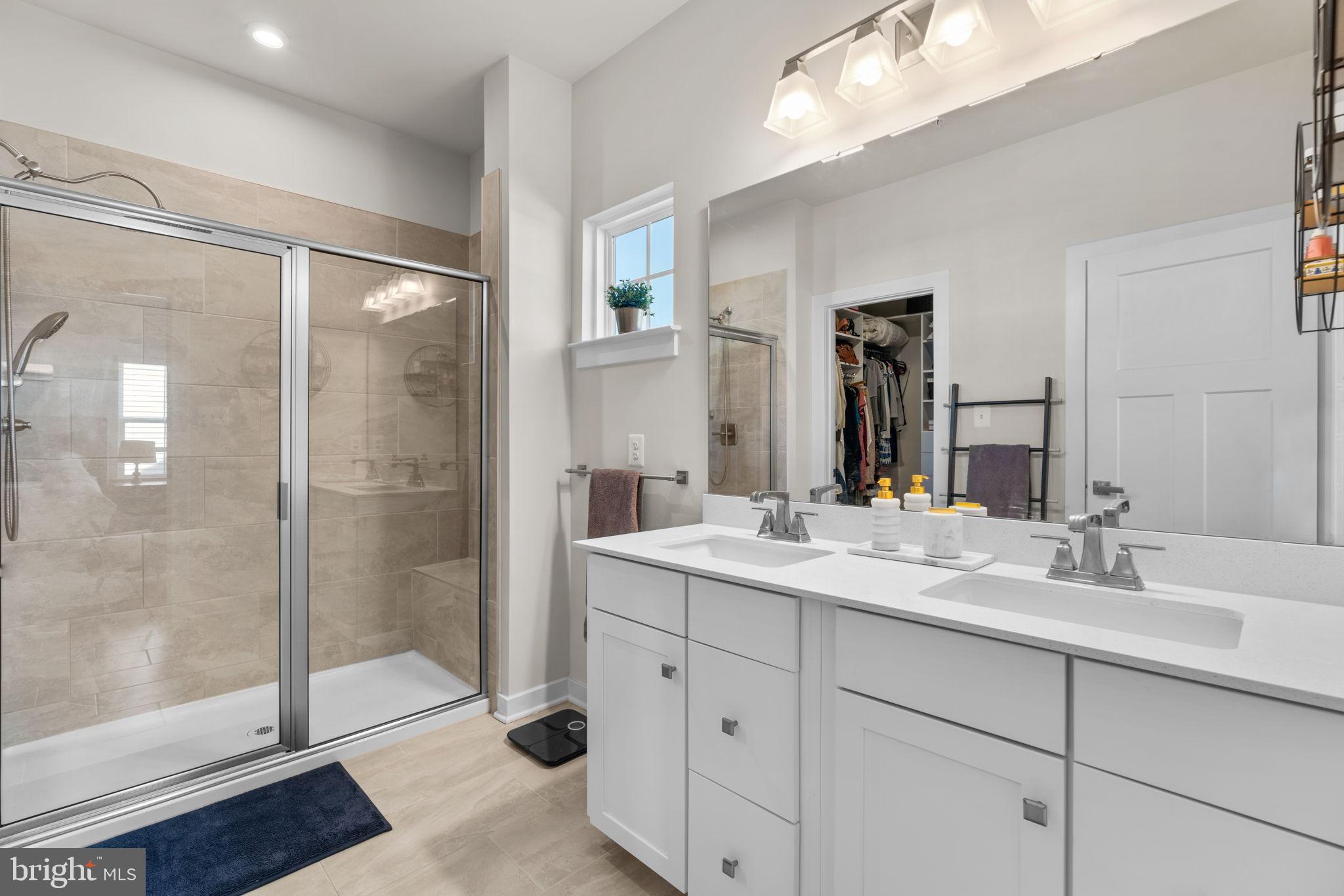 203 Baughmans Lane Frederick, MD 21702 - Photo 32 of 56 Modern bathroom with sleek design elements.