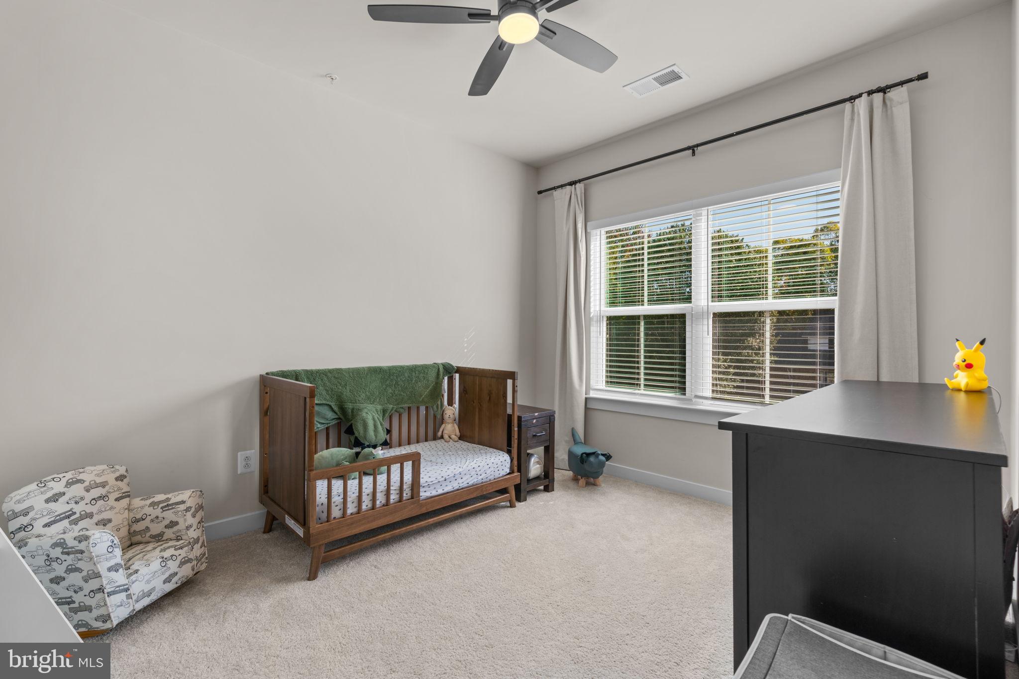203 Baughmans Lane Frederick, MD 21702 - Photo 35 of 56 Bright and airy nursery with natural light.