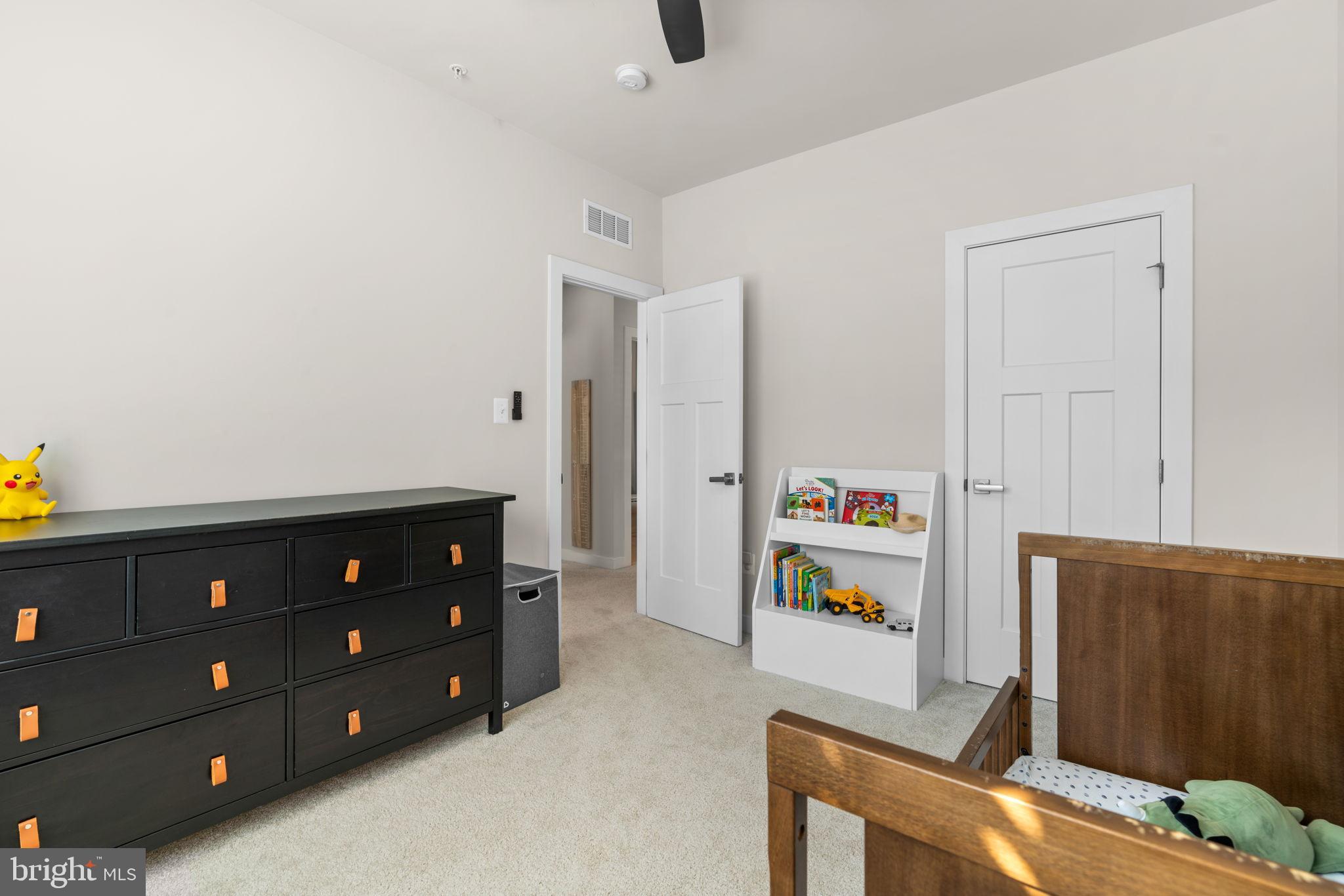 203 Baughmans Lane Frederick, MD 21702 - Photo 37 of 56 Bright and inviting children's bedroom space.