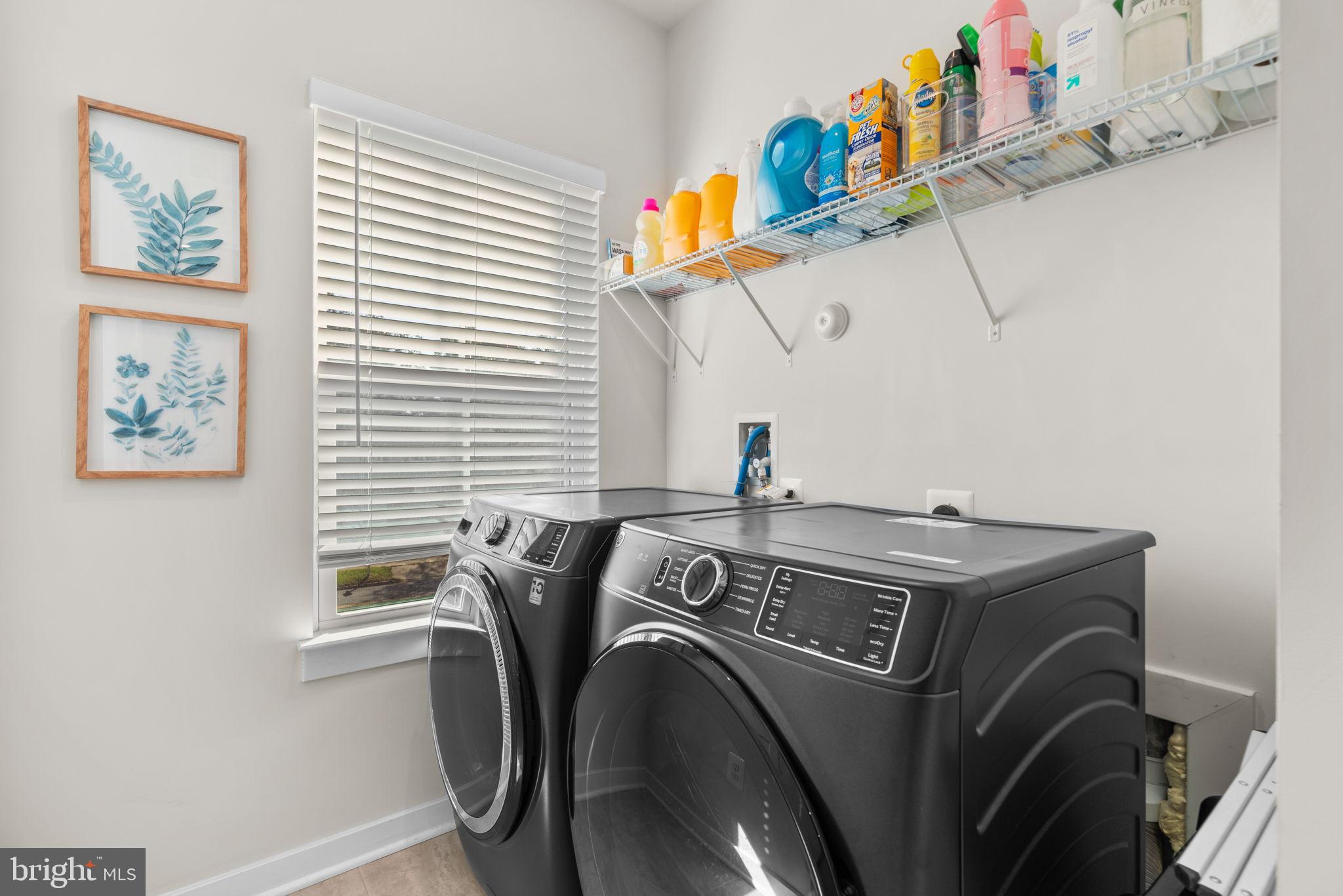 203 Baughmans Lane Frederick, MD 21702 - Photo 38 of 56 Modern laundry room with organized essentials.
