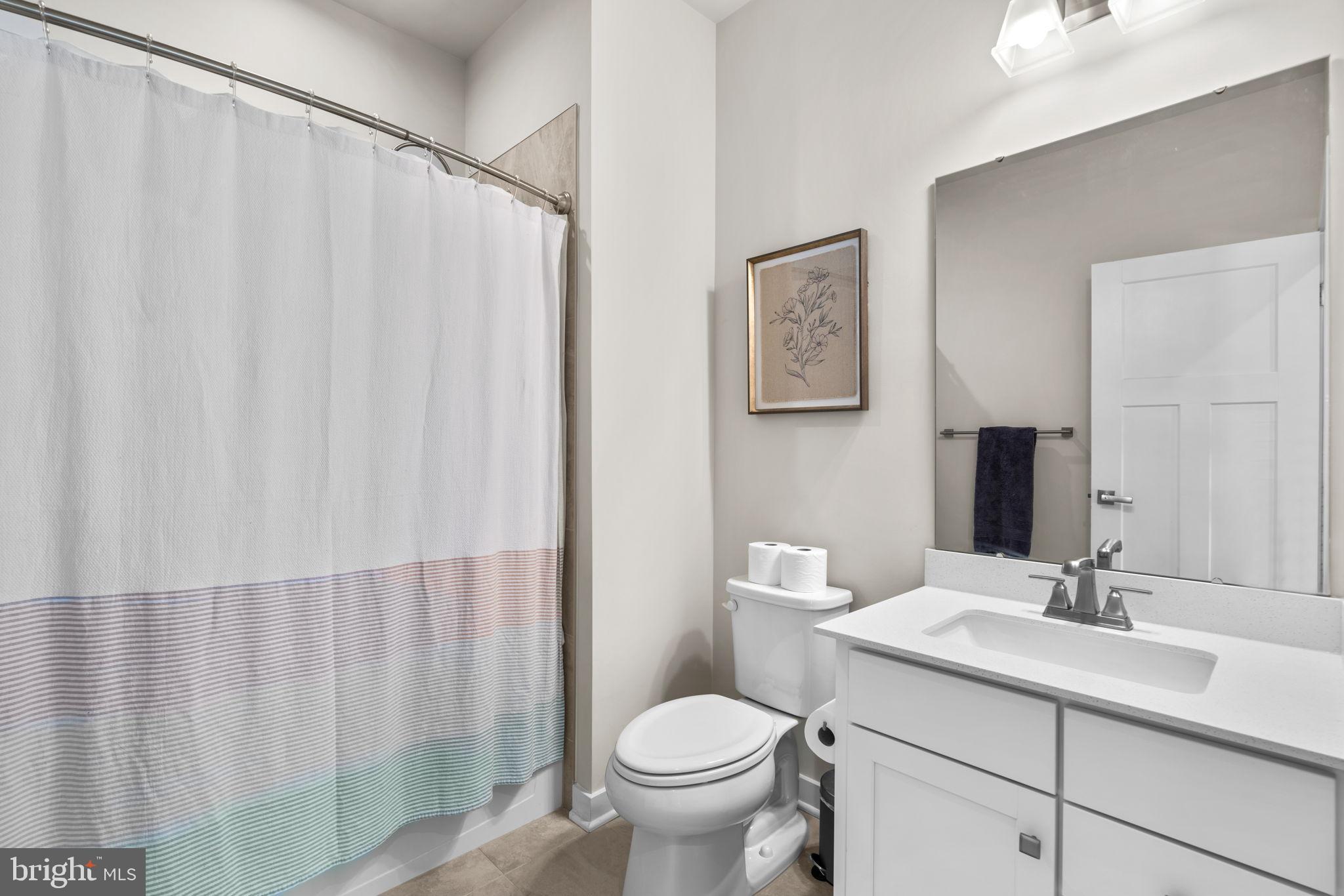 203 Baughmans Lane Frederick, MD 21702 - Photo 39 of 56 Modern bathroom with sleek finishes.