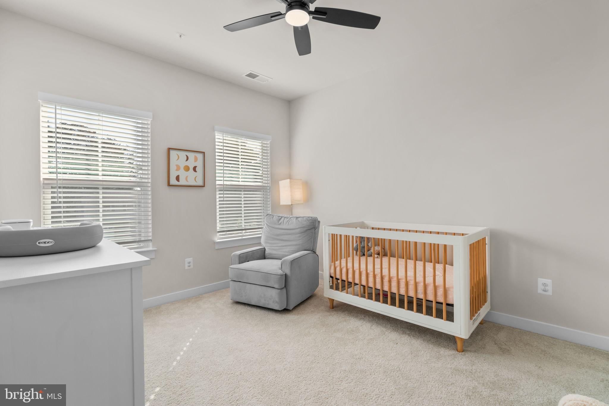 203 Baughmans Lane Frederick, MD 21702 - Photo 40 of 56 Serene nursery with natural light and comfort.