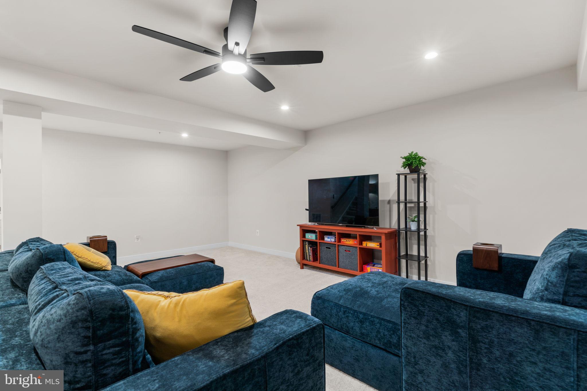 203 Baughmans Lane Frederick, MD 21702 - Photo 44 of 56 Spacious, modern living area with sleek design.