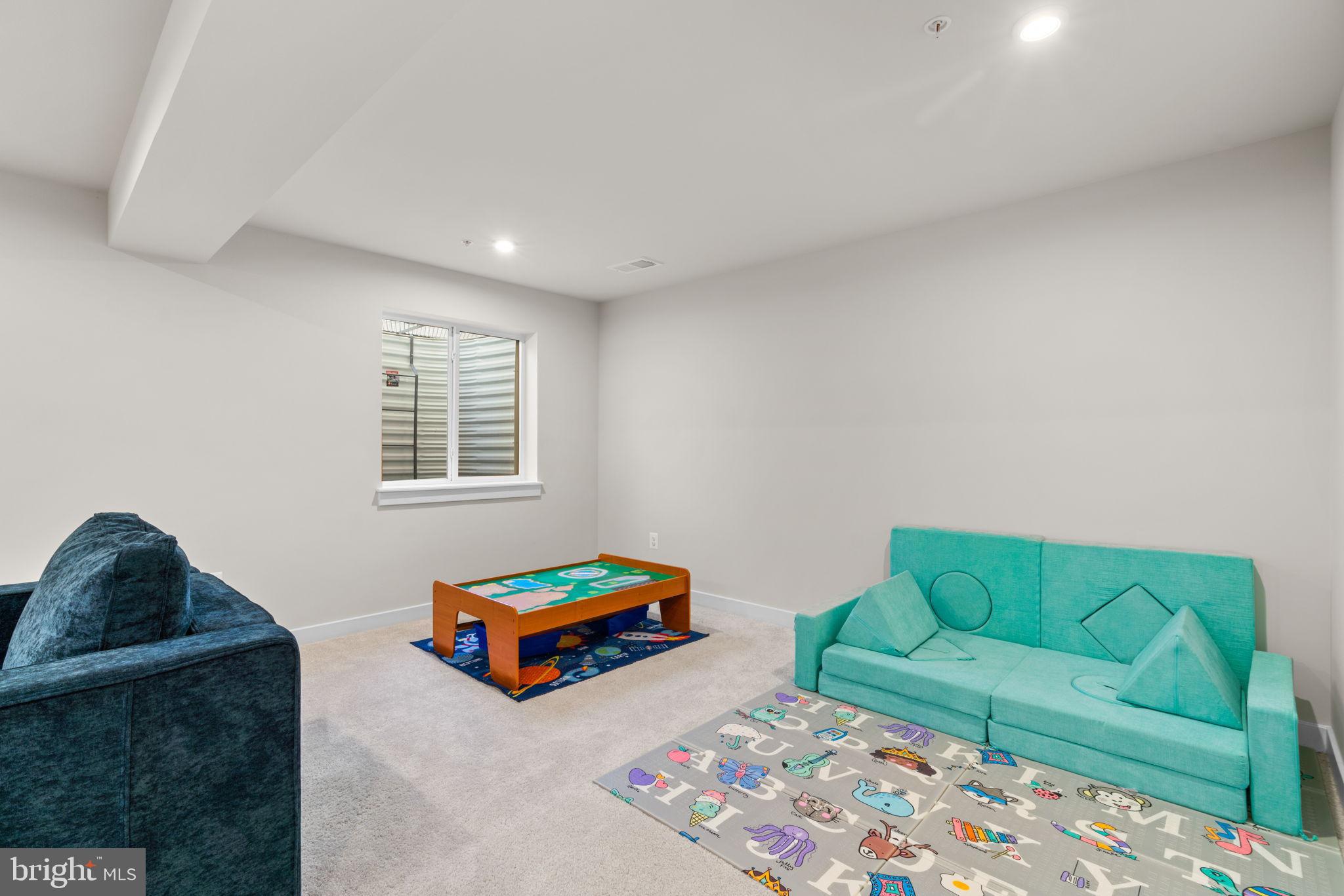 203 Baughmans Lane Frederick, MD 21702 - Photo 45 of 56 Bright and inviting playroom retreat.