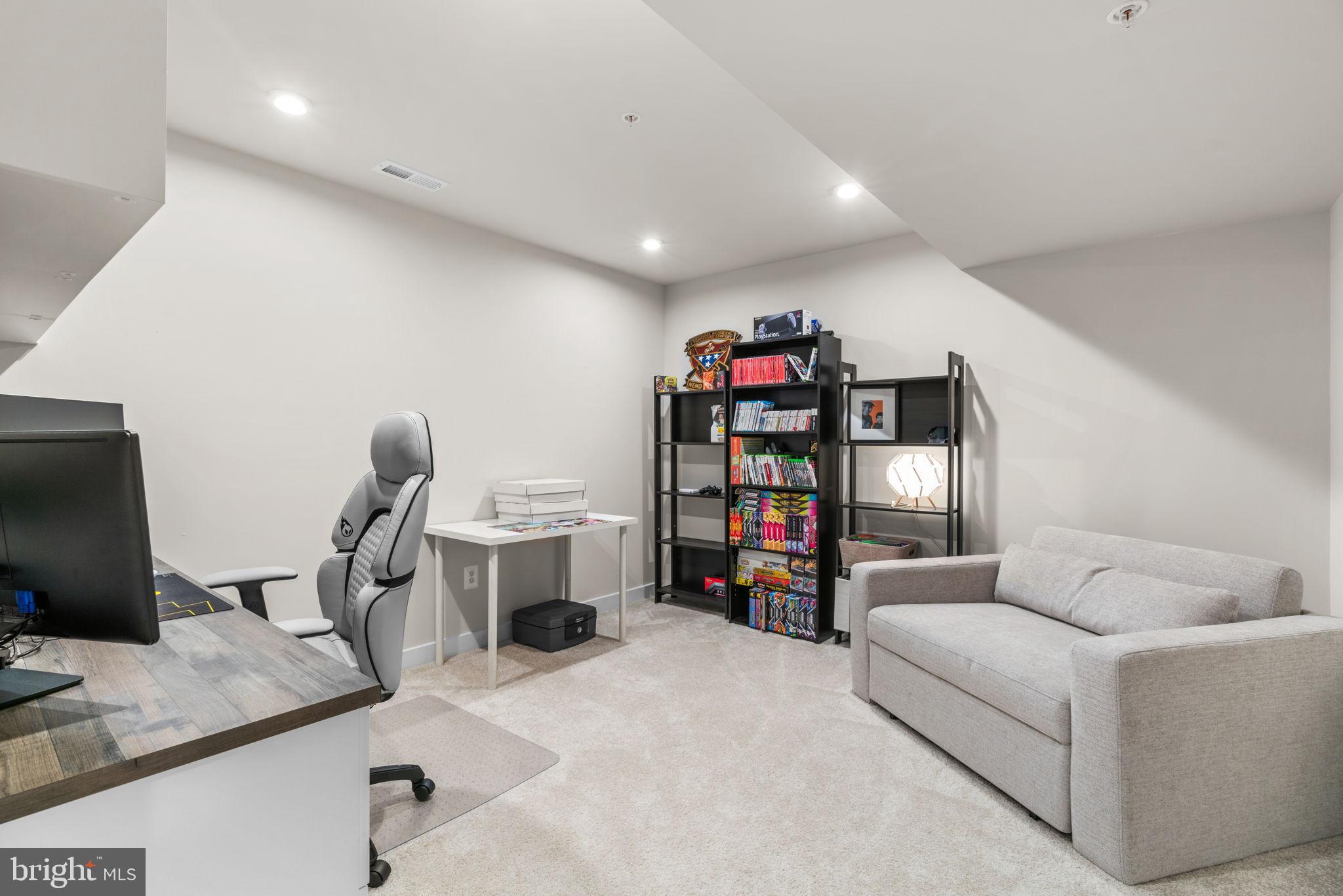 203 Baughmans Lane Frederick, MD 21702 - Photo 47 of 56 Versatile space for work and relaxation.