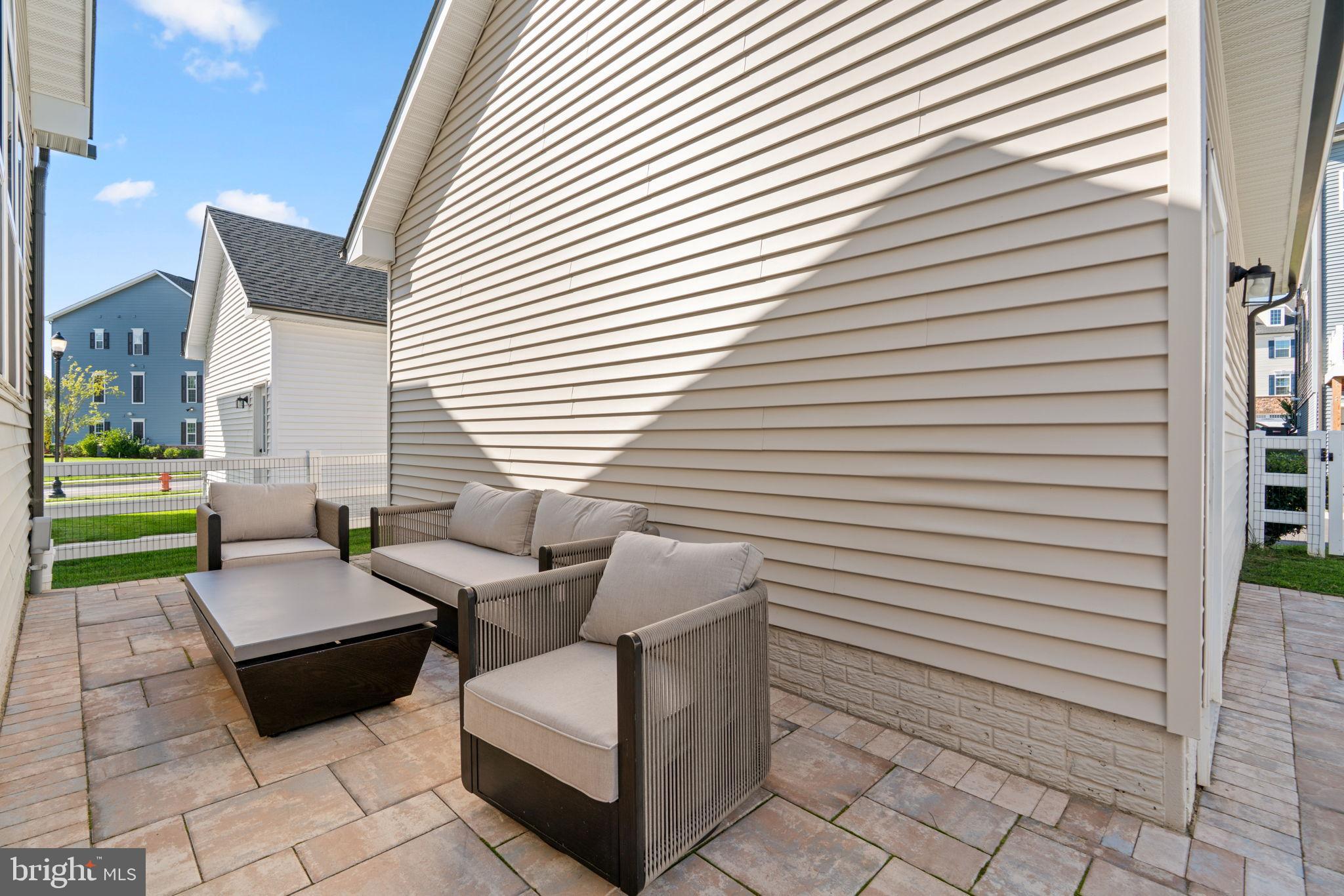 203 Baughmans Lane Frederick, MD 21702 - Photo 52 of 56 Charming patio for outdoor relaxation.