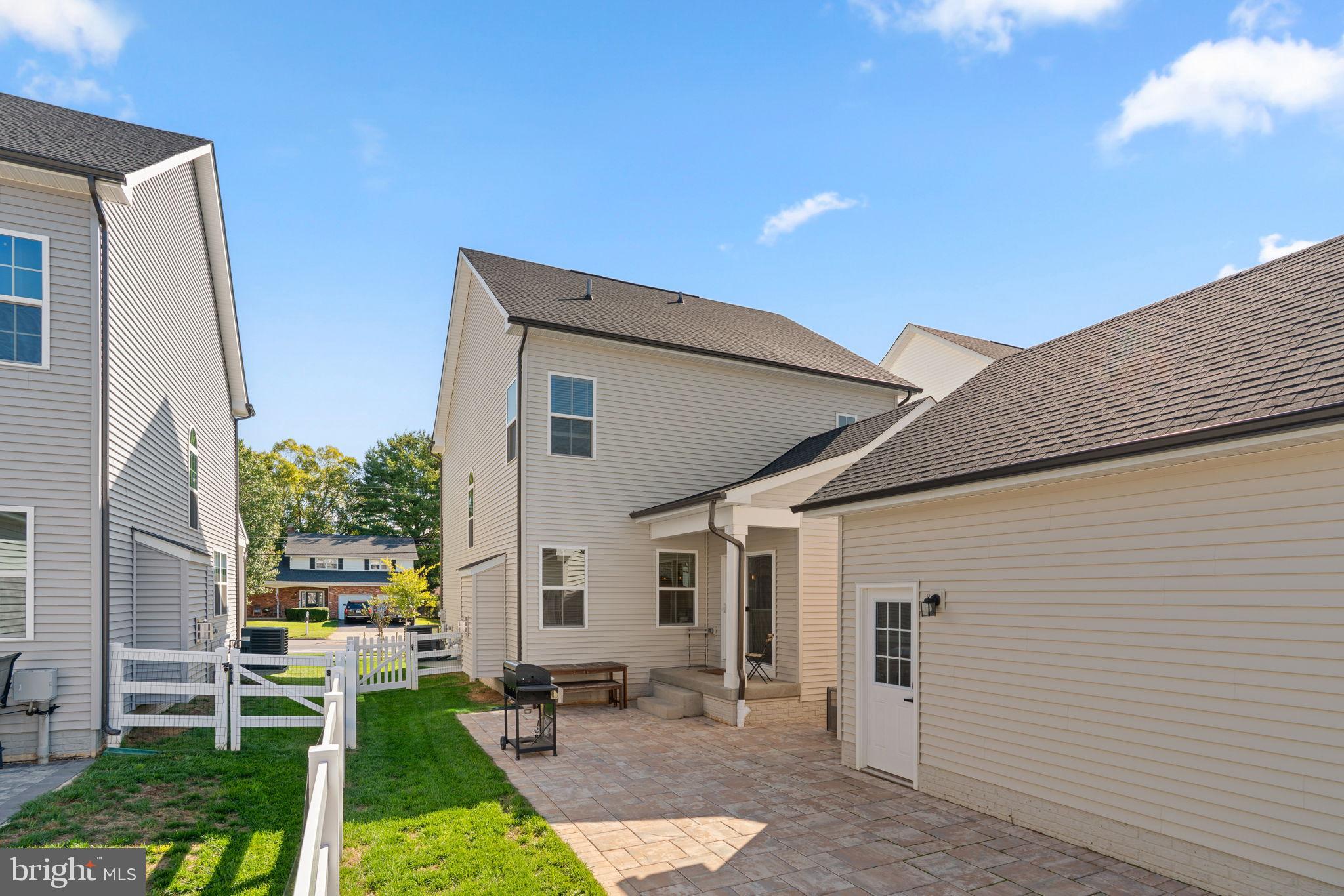 203 Baughmans Lane Frederick, MD 21702 - Photo 53 of 56 Charming backyard retreat with sunny skies.