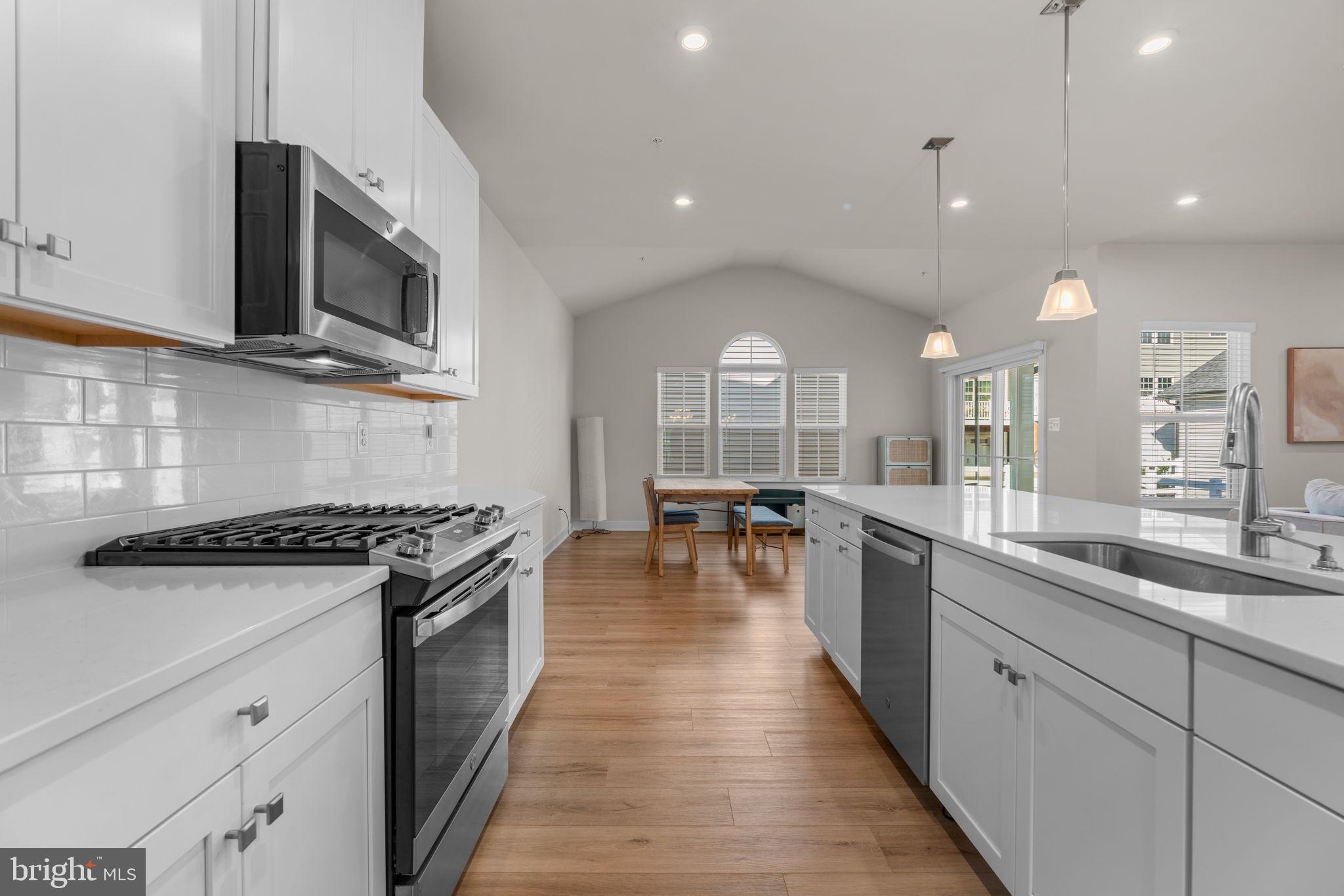203 Baughmans Lane Frederick, MD 21702 - Photo 7 of 56 Modern kitchen with open layout charm.