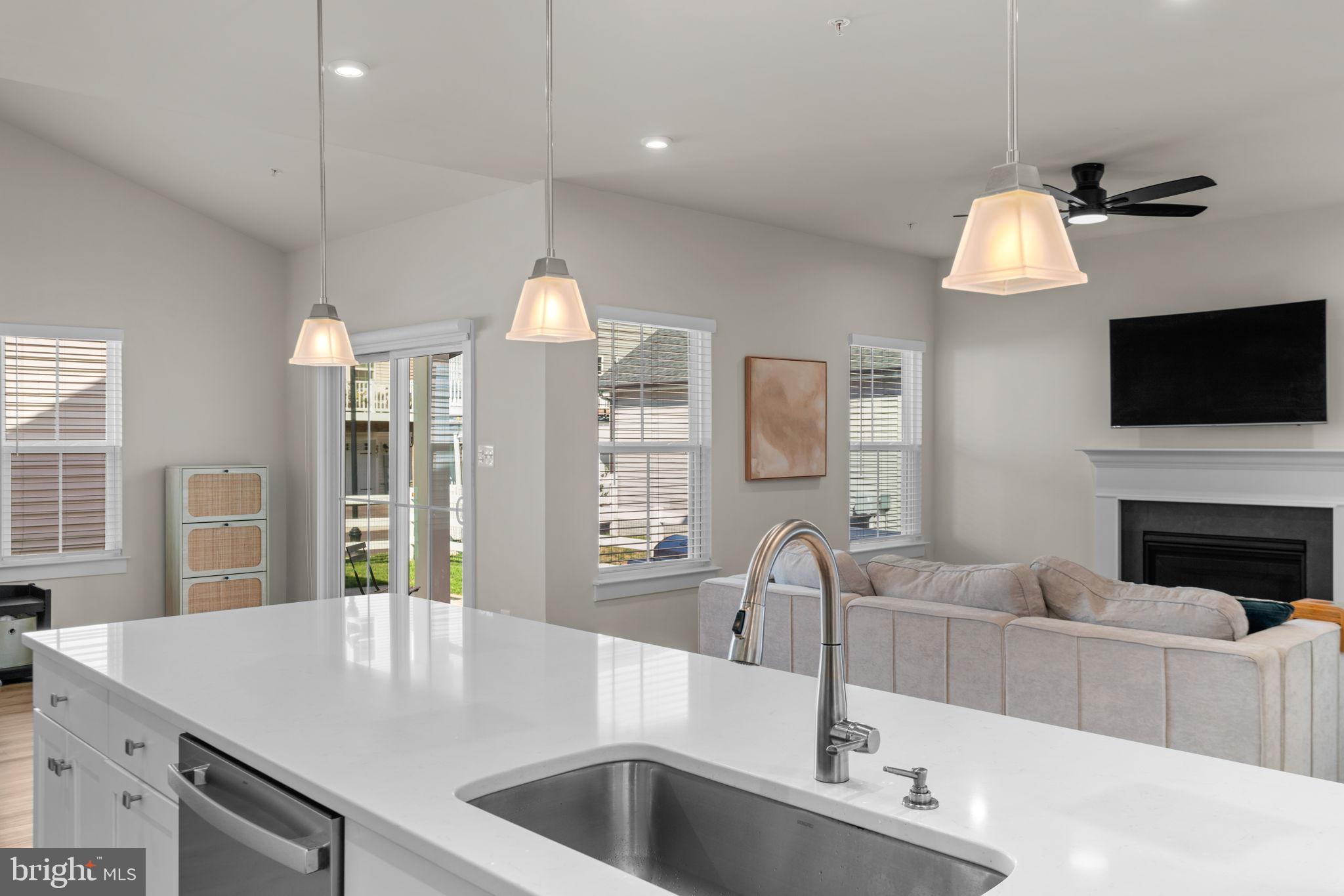 203 Baughmans Lane Frederick, MD 21702 - Photo 9 of 56 Bright and airy open-concept living space.