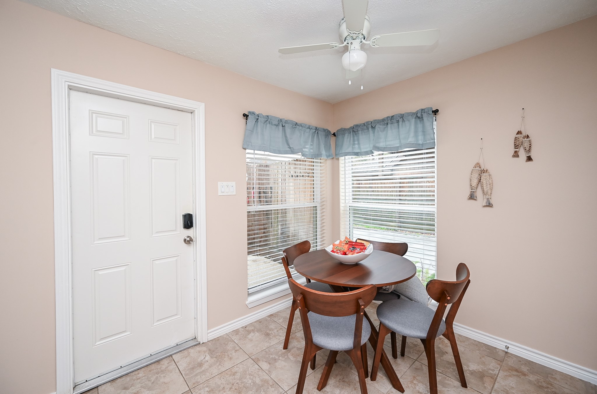 19414 Dianeshire Drive Spring, TX 77388 - Photo 22 of 30 a view of a dining room with furniture window and outside view