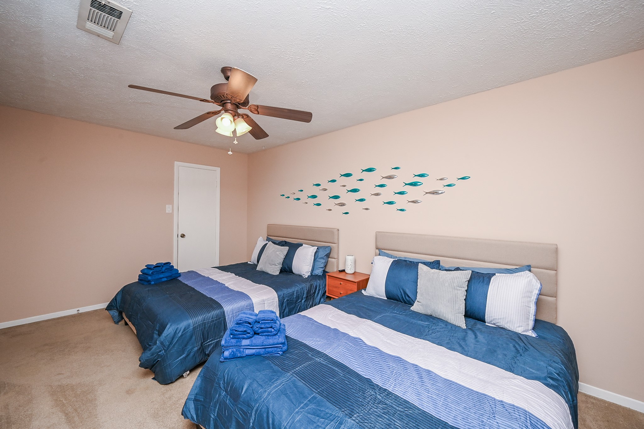 19414 Dianeshire Drive Spring, TX 77388 - Photo 27 of 30 a bedroom with bed and a chandelier