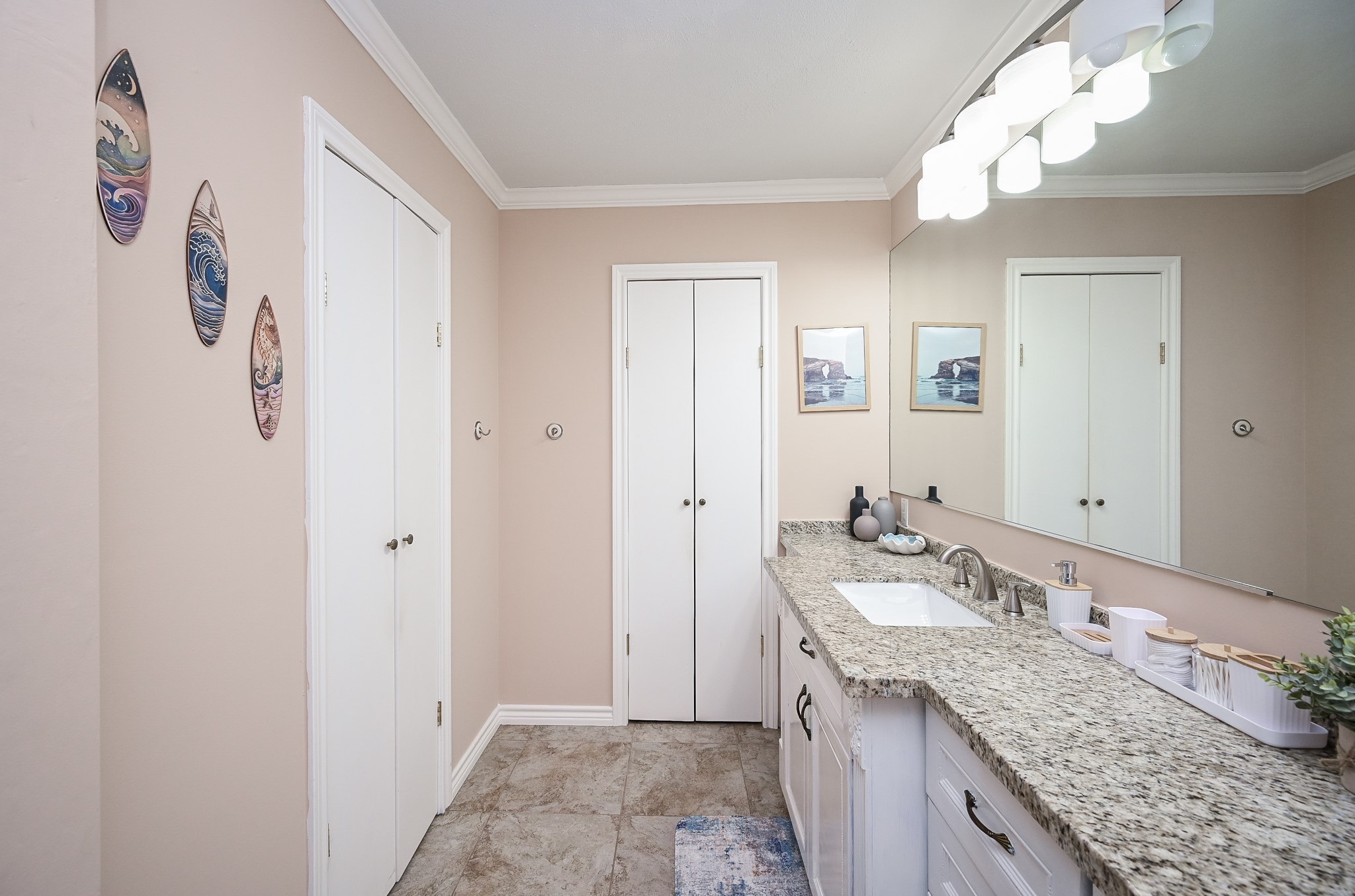 19414 Dianeshire Drive Spring, TX 77388 - Photo 9 of 30 a bathroom with a granite countertop sink and a mirror