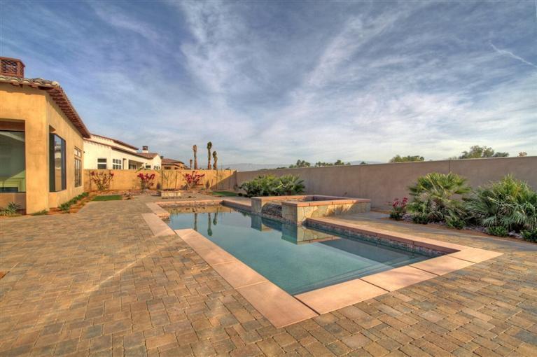 54540 Alysheba Drive La Quinta, CA 92253 - Photo 4 of 4 a view of a swimming pool with an outdoor seating