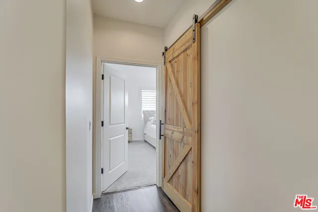 a view of a bathroom from a hallway