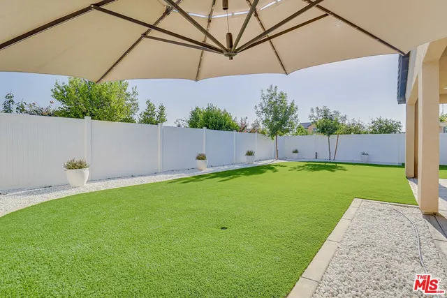 a view of a room with a garden and plants