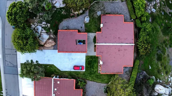 an aerial view of residential house with outdoor space and street view