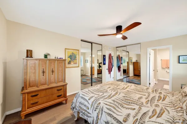 a bed room with a bed and a walk in closet