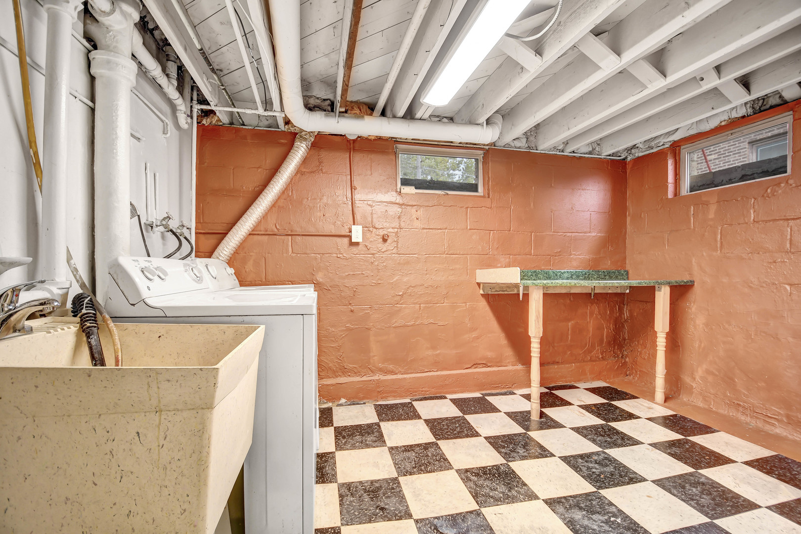 2950 Bernice Road Lansing, IL 60438 - Photo 14 of 16 a bathroom with a sink a toilet and a mirror
