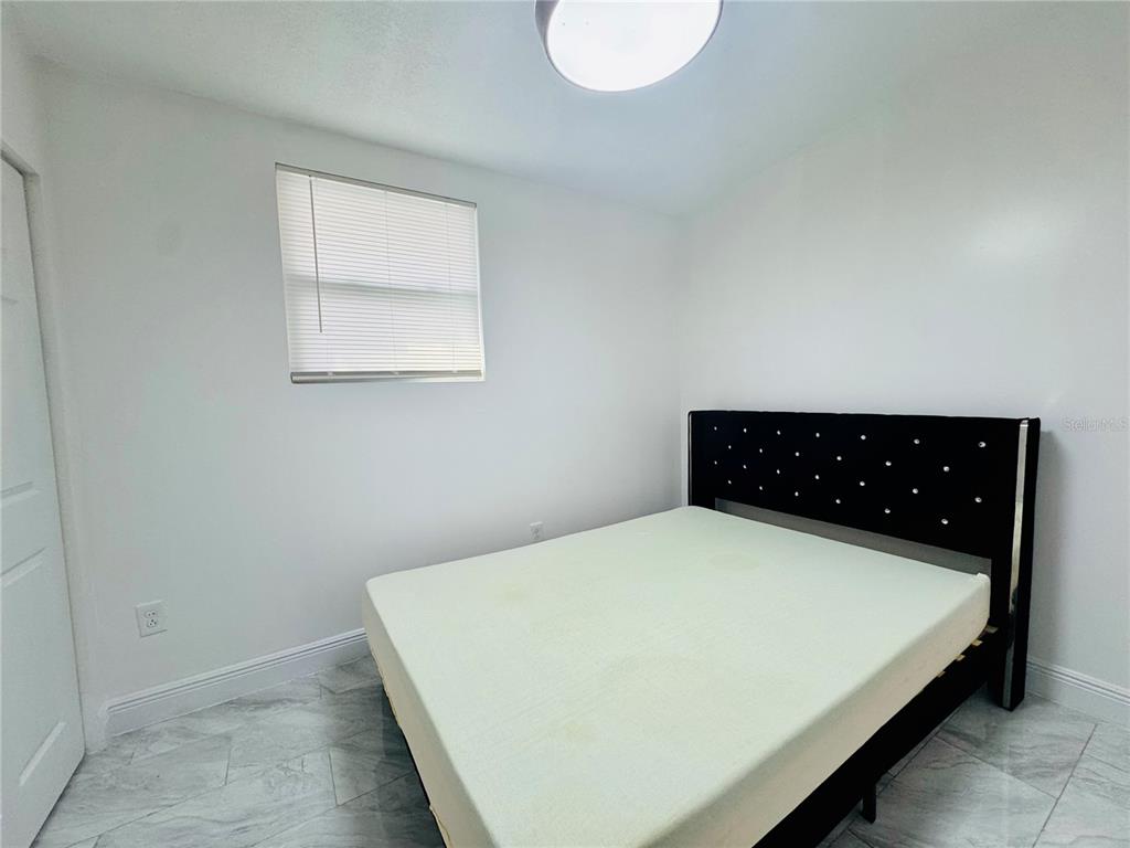 18304 Cedarhurst Road Orlando, FL 32820 - Photo 20 of 24 a close up of a bed