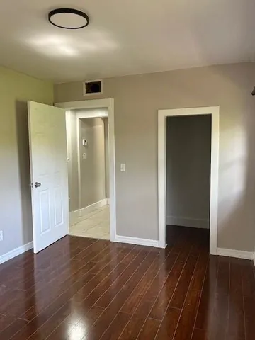 wooden floor in an empty room with wooden floor