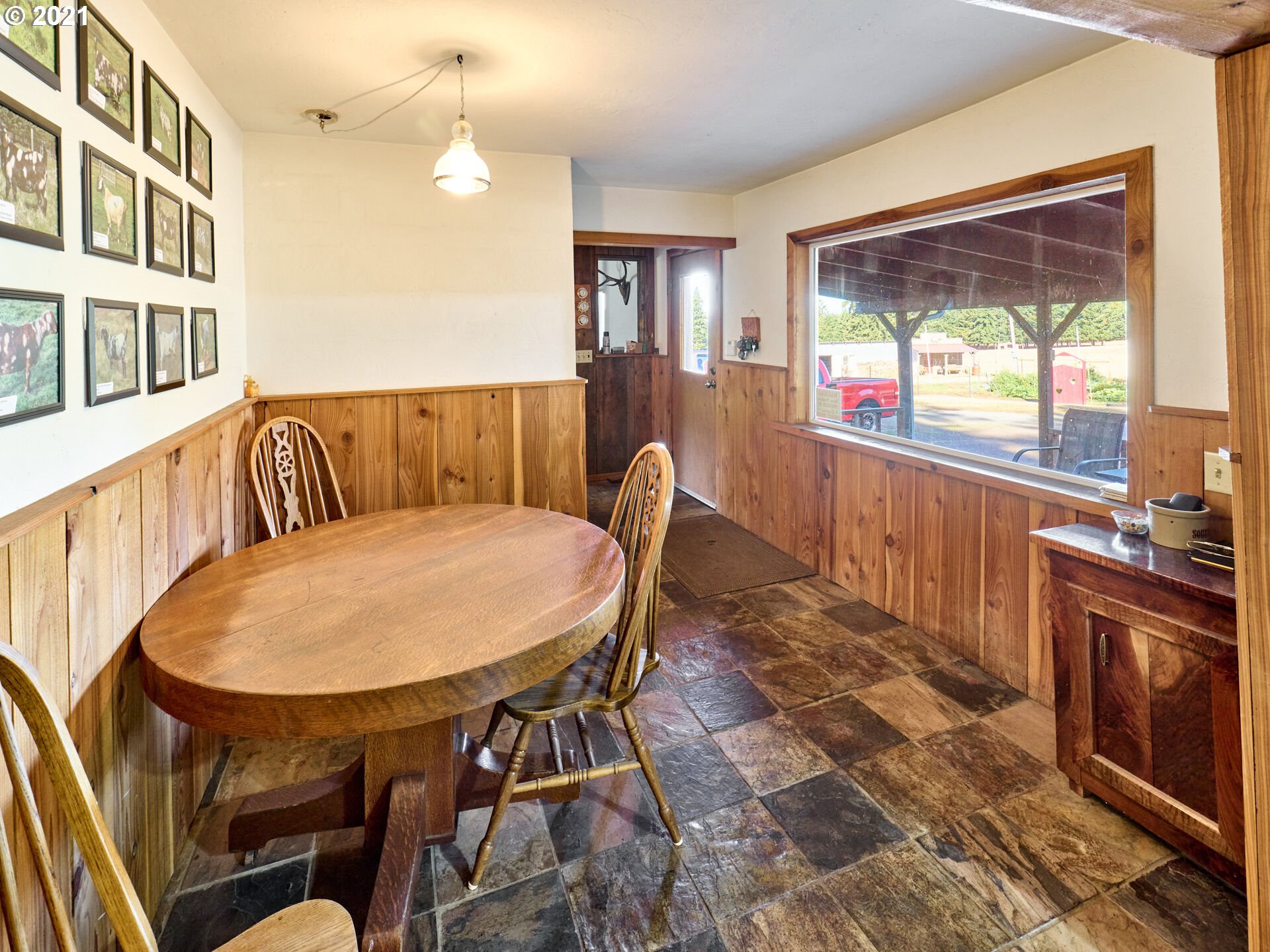 36799 South Hibbard Road Molalla, OR 97038 - Photo 7 of 32 a view of a dining room with furniture window and outside view