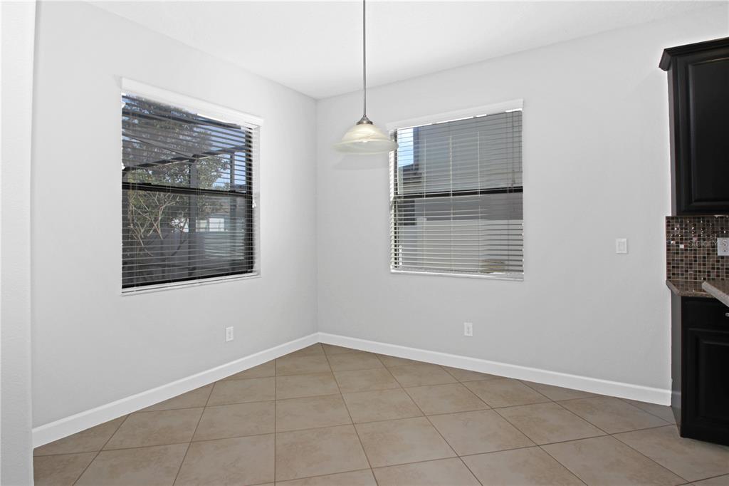 2069 Nerva Road Winter Garden, FL 34787 - Photo 11 of 41 a view of an empty room with a window