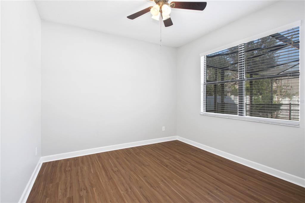 2069 Nerva Road Winter Garden, FL 34787 - Photo 12 of 41 wooden floor in an empty room with a window