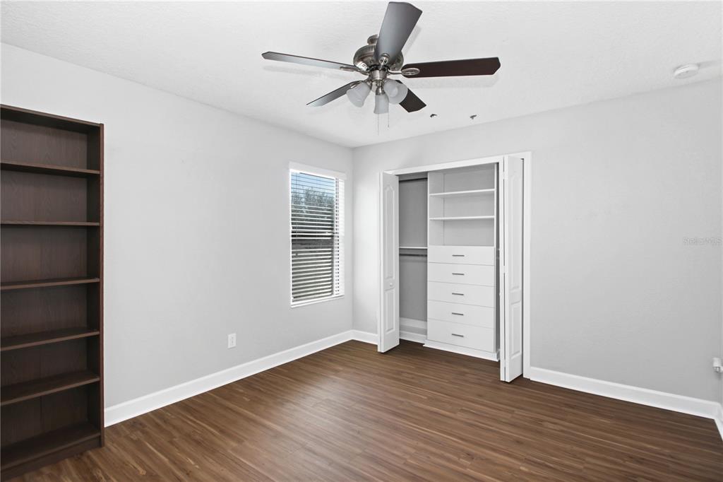 2069 Nerva Road Winter Garden, FL 34787 - Photo 19 of 41 wooden floor in an empty room with a window