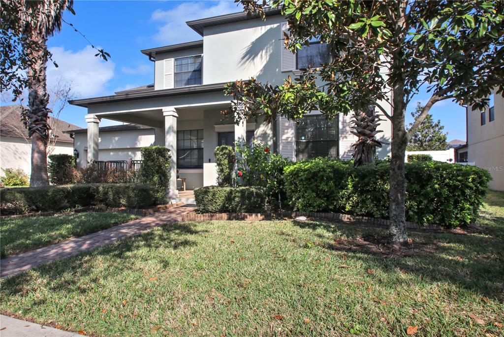 2069 Nerva Road Winter Garden, FL 34787 - Photo 2 of 41 front view of a house with a yard