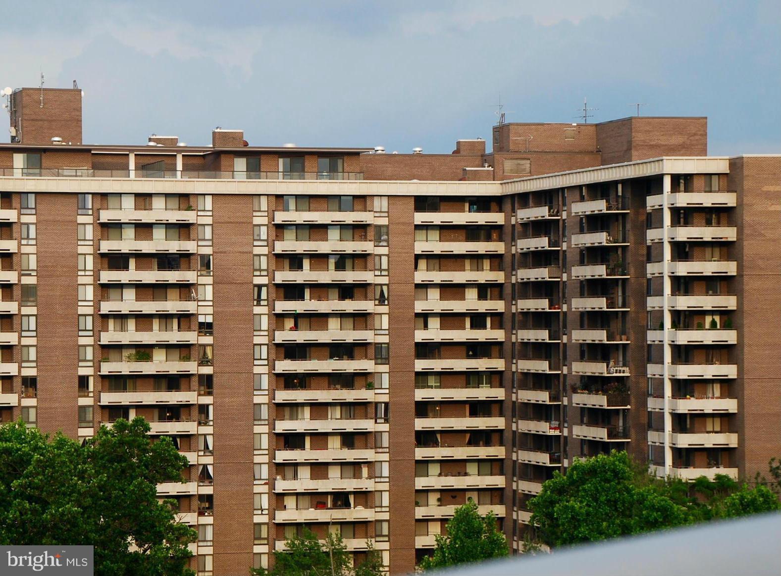 a front view of a building with a street