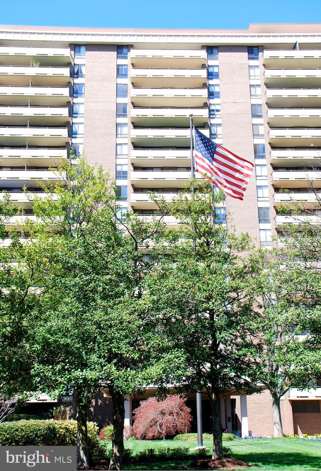 1800 Old Meadow Road, Unit 1510 McLean, VA 22102 - Photo 2 of 25 a house view with a garden space