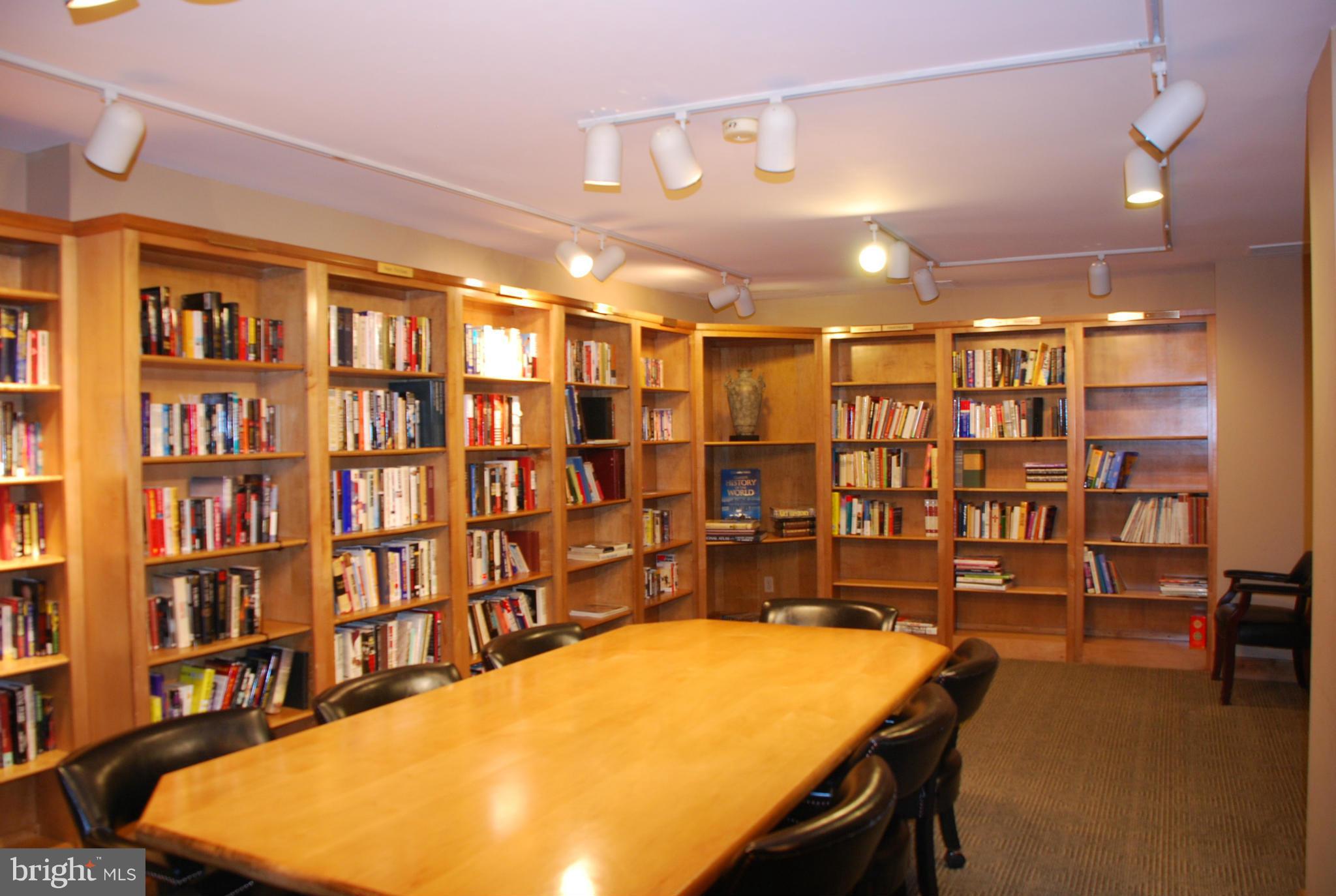1800 Old Meadow Road, Unit 1510 McLean, VA 22102 - Photo 14 of 25 a room with furniture pool table and book shelf