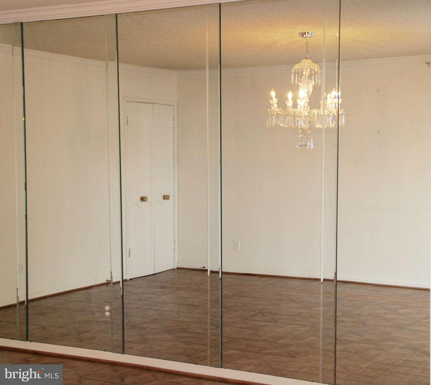 1800 Old Meadow Road, Unit 1510 McLean, VA 22102 - Photo 9 of 25 a view of a livingroom with a ceiling fan