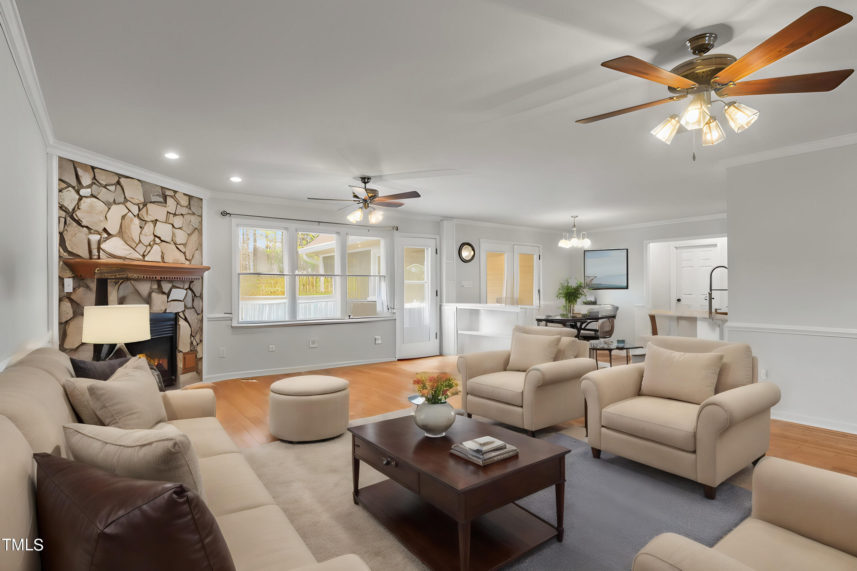 505 Castleberry Road Clayton, NC 27527 - Photo 2 of 38 a living room with furniture and a large window