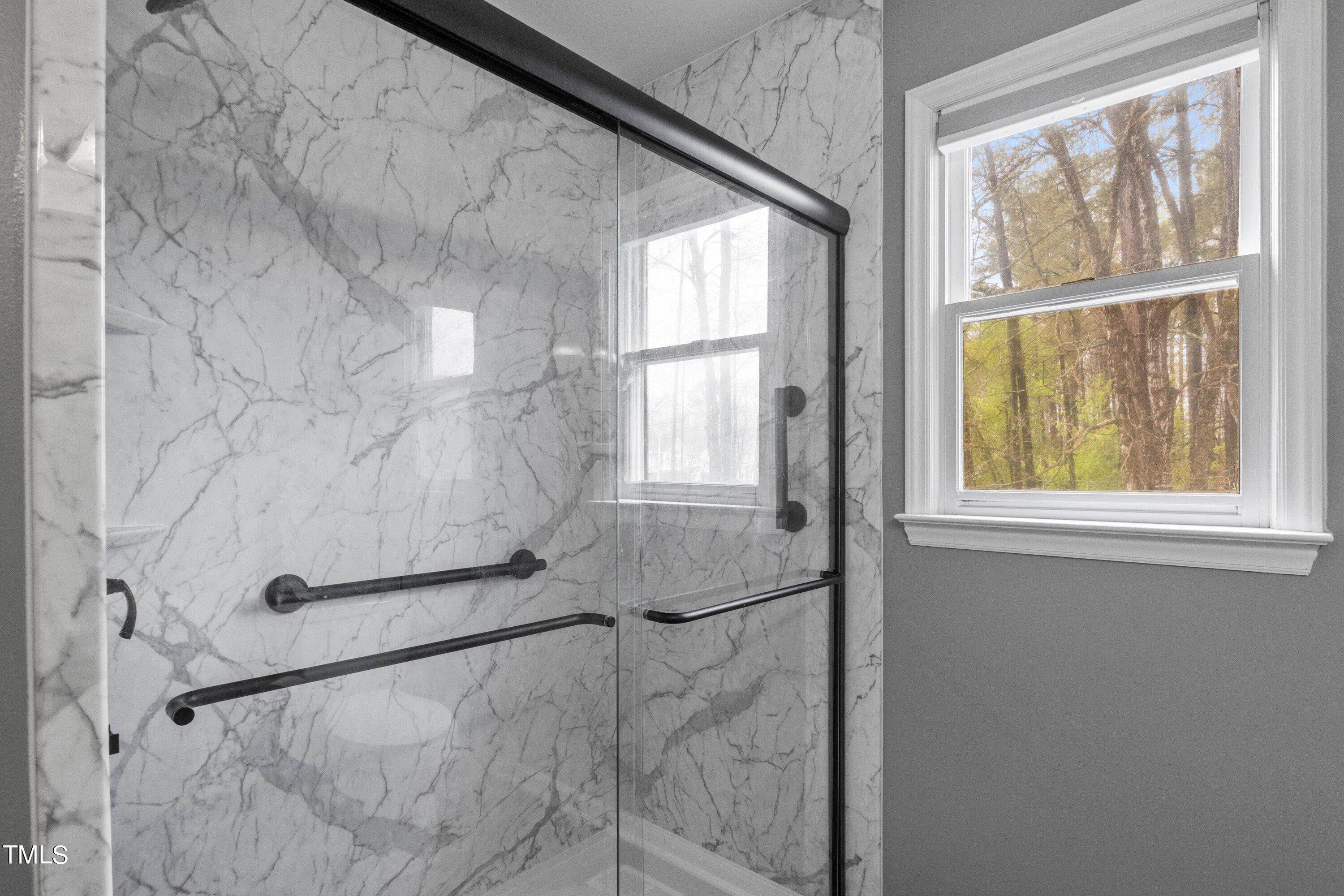 505 Castleberry Road Clayton, NC 27527 - Photo 28 of 38 a bathroom with a shower