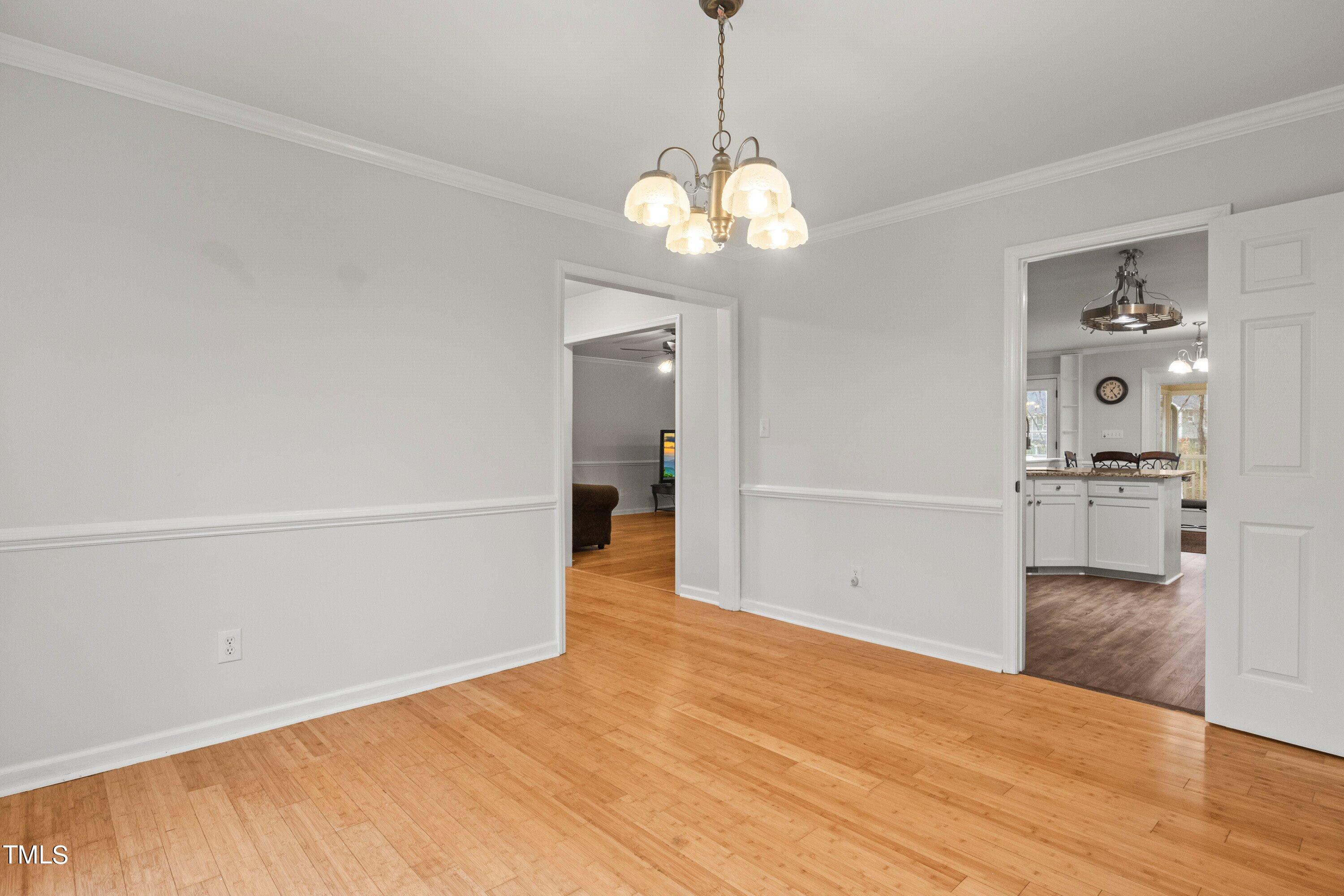 505 Castleberry Road Clayton, NC 27527 - Photo 31 of 38 a view of a livingroom with wooden floor