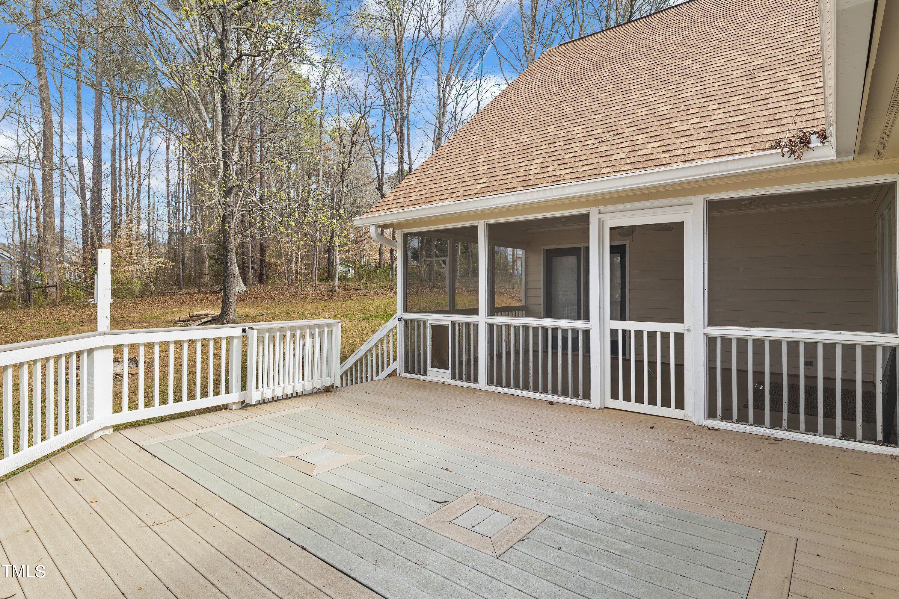 505 Castleberry Road Clayton, NC 27527 - Photo 34 of 38 a view of a wooden deck