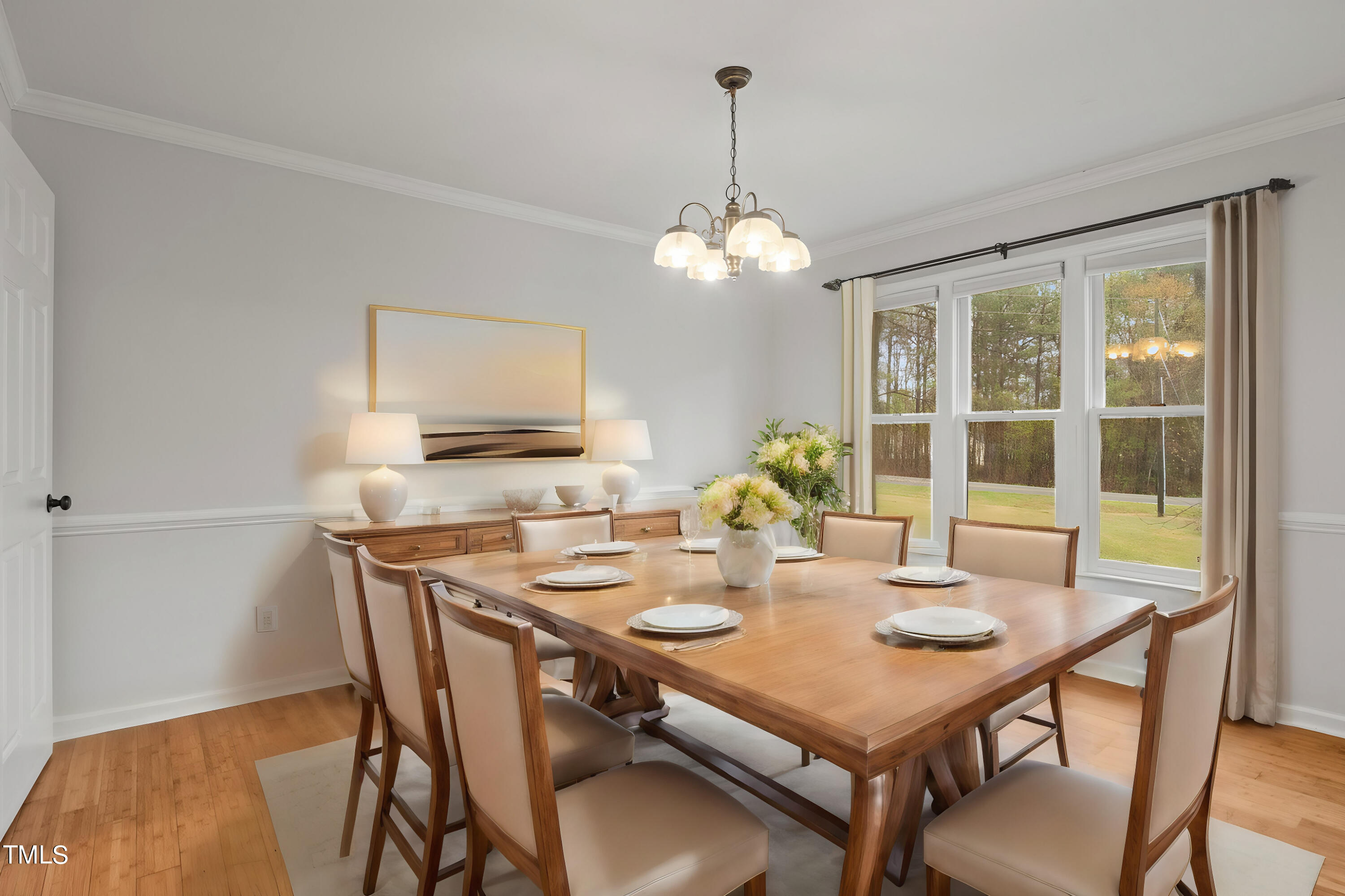 505 Castleberry Road Clayton, NC 27527 - Photo 5 of 38 a view of a dining room with furniture window and outside view
