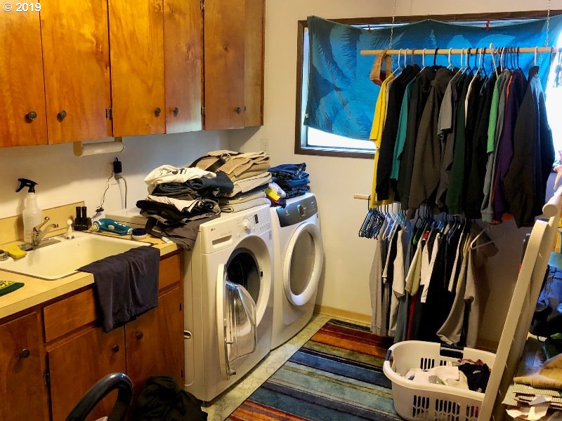 23805 South Rondevic Road Canby, OR 97013 - Photo 15 of 15 a view of walk in closet with clothes and shoes