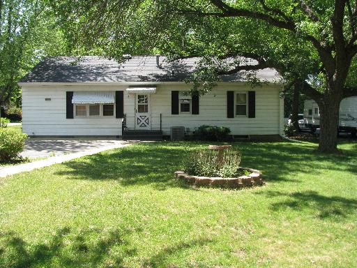 3380 Sadler Road Morris, IL 60450 - Photo 3 of 14 a front view of a house with a garden