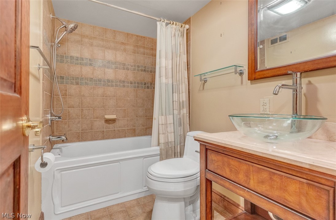 2990 Hampton Road Cleveland, OH 44120 - Photo 21 of 29 Bathroom featuring vanity and shower / tub combo