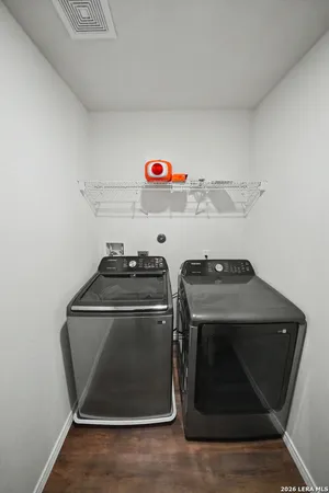 a utility room with dryer and washer